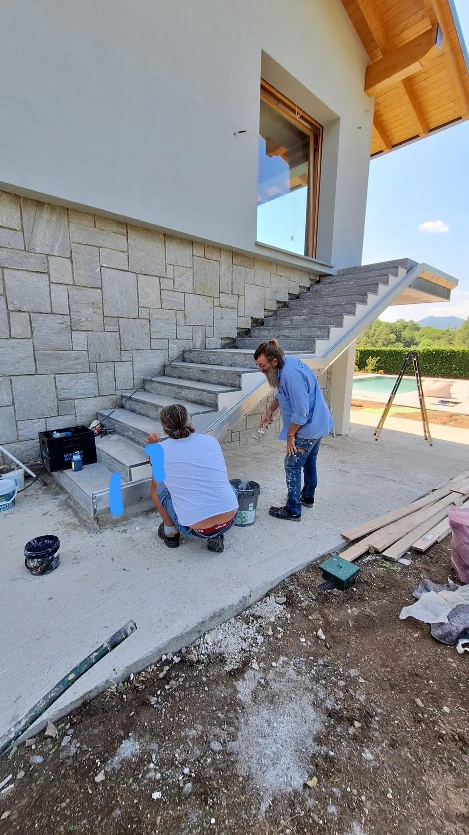 End-of-works cleaning on an outdoor stone staircase